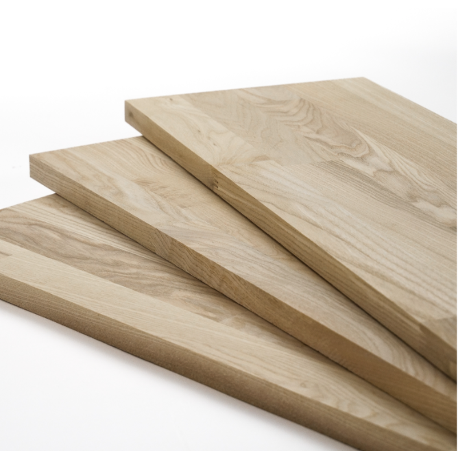 Stack of solid edge glued wood panels, showcasing natural wood grains.