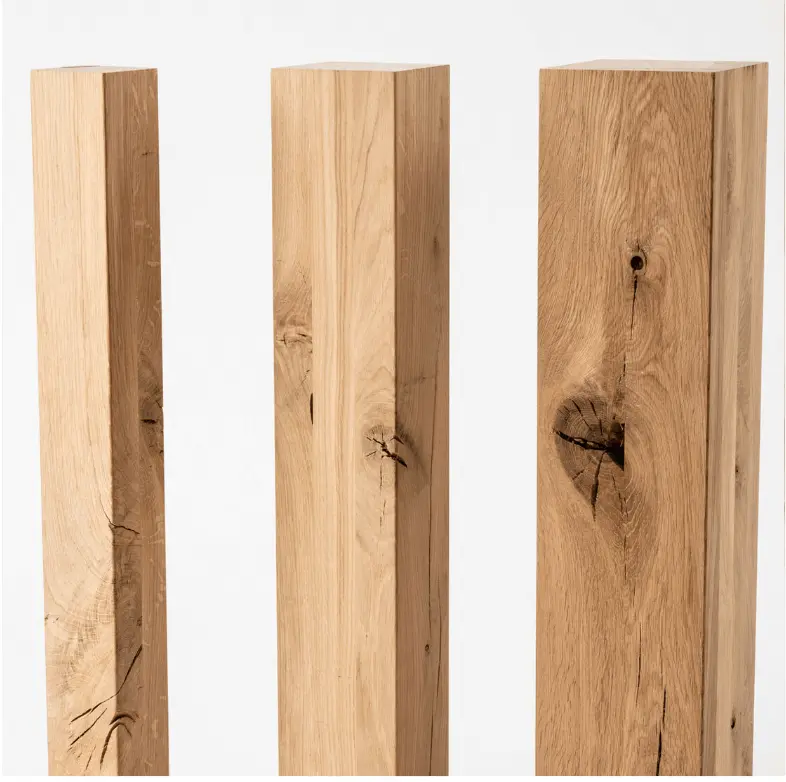 Vertical array of Green Oak beams, showcasing their natural strength and character.